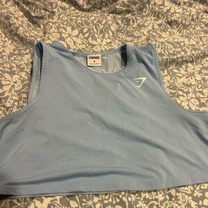 Gymshark light blue athletic top, women's size M